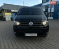 Черный Фольксваген Мультиван, объемом двигателя 2 л и пробегом 312 тыс. км за 22500 $, фото 1 на Automoto.ua