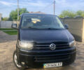 Черный Фольксваген Мультиван, объемом двигателя 2 л и пробегом 261 тыс. км за 20000 $, фото 3 на Automoto.ua