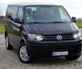 Черный Фольксваген Мультиван, объемом двигателя 2 л и пробегом 195 тыс. км за 9400 $, фото 1 на Automoto.ua