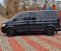 Черный Фольксваген Мультиван, объемом двигателя 2.5 л и пробегом 286 тыс. км за 18500 $, фото 4 на Automoto.ua