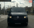 Чорний Фольксваген Мультиван, об'ємом двигуна 2 л та пробігом 311 тис. км за 21499 $, фото 1 на Automoto.ua