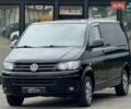 Черный Фольксваген Мультиван, объемом двигателя 2 л и пробегом 300 тыс. км за 20500 $, фото 1 на Automoto.ua