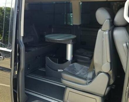 Черный Фольксваген Мультиван, объемом двигателя 2 л и пробегом 149 тыс. км за 30000 $, фото 2 на Automoto.ua