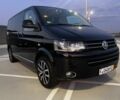 Черный Фольксваген Мультиван, объемом двигателя 2 л и пробегом 122 тыс. км за 8600 $, фото 1 на Automoto.ua