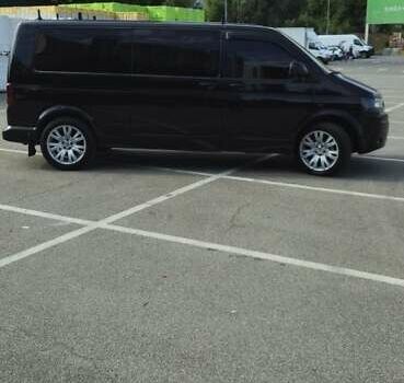 Черный Фольксваген Мультиван, объемом двигателя 2 л и пробегом 149 тыс. км за 30000 $, фото 1 на Automoto.ua