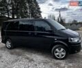 Черный Фольксваген Мультиван, объемом двигателя 1.98 л и пробегом 215 тыс. км за 29300 $, фото 2 на Automoto.ua