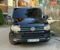 Чорний Фольксваген Мультиван, об'ємом двигуна 2 л та пробігом 310 тис. км за 29500 $, фото 1 на Automoto.ua