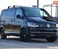 Чорний Фольксваген Мультиван, об'ємом двигуна 2 л та пробігом 216 тис. км за 41555 $, фото 1 на Automoto.ua