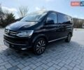 Черный Фольксваген Мультиван, объемом двигателя 2 л и пробегом 175 тыс. км за 42000 $, фото 1 на Automoto.ua
