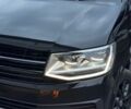 Черный Фольксваген Мультиван, объемом двигателя 2 л и пробегом 220 тыс. км за 30800 $, фото 1 на Automoto.ua