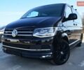 Чорний Фольксваген Мультиван, об'ємом двигуна 2 л та пробігом 216 тис. км за 41555 $, фото 1 на Automoto.ua
