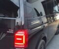 Черный Фольксваген Мультиван, объемом двигателя 2 л и пробегом 220 тыс. км за 30800 $, фото 3 на Automoto.ua