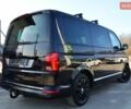 Чорний Фольксваген Мультиван, об'ємом двигуна 2 л та пробігом 216 тис. км за 41555 $, фото 33 на Automoto.ua