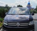 Черный Фольксваген Мультиван, объемом двигателя 2 л и пробегом 260 тыс. км за 32000 $, фото 1 на Automoto.ua