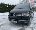 Черный Фольксваген Мультиван, объемом двигателя 2 л и пробегом 223 тыс. км за 37000 $, фото 1 на Automoto.ua