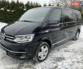 Черный Фольксваген Мультиван, объемом двигателя 2 л и пробегом 223 тыс. км за 37000 $, фото 2 на Automoto.ua