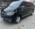 Черный Фольксваген Мультиван, объемом двигателя 2 л и пробегом 223 тыс. км за 37000 $, фото 1 на Automoto.ua