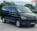Черный Фольксваген Мультиван, объемом двигателя 2 л и пробегом 253 тыс. км за 34700 $, фото 1 на Automoto.ua