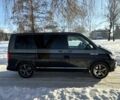 Черный Фольксваген Мультиван, объемом двигателя 2 л и пробегом 263 тыс. км за 39000 $, фото 2 на Automoto.ua