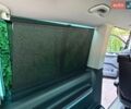 Черный Фольксваген Мультиван, объемом двигателя 2 л и пробегом 179 тыс. км за 38900 $, фото 102 на Automoto.ua