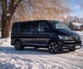 Чорний Фольксваген Мультиван, об'ємом двигуна 2 л та пробігом 267 тис. км за 35280 $, фото 1 на Automoto.ua