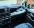 Чорний Фольксваген Мультиван, об'ємом двигуна 2 л та пробігом 179 тис. км за 38900 $, фото 72 на Automoto.ua
