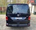 Черный Фольксваген Мультиван, объемом двигателя 1.97 л и пробегом 243 тыс. км за 42000 $, фото 2 на Automoto.ua