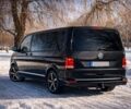 Чорний Фольксваген Мультиван, об'ємом двигуна 2 л та пробігом 246 тис. км за 39000 $, фото 2 на Automoto.ua