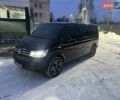 Черный Фольксваген Мультиван, объемом двигателя 2 л и пробегом 204 тыс. км за 48900 $, фото 1 на Automoto.ua