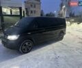 Черный Фольксваген Мультиван, объемом двигателя 2 л и пробегом 204 тыс. км за 48900 $, фото 1 на Automoto.ua