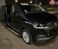 Черный Фольксваген Мультиван, объемом двигателя 2 л и пробегом 151 тыс. км за 59200 $, фото 1 на Automoto.ua