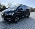Чорний Фольксваген Мультиван, об'ємом двигуна 2 л та пробігом 175 тис. км за 43229 $, фото 1 на Automoto.ua