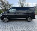 Чорний Фольксваген Мультиван, об'ємом двигуна 2 л та пробігом 175 тис. км за 43229 $, фото 2 на Automoto.ua