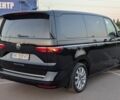 Чорний Фольксваген Мультиван, об'ємом двигуна 2 л та пробігом 85 тис. км за 70027 $, фото 2 на Automoto.ua