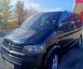 Черный Фольксваген Мультиван, объемом двигателя 3.2 л и пробегом 280 тыс. км за 15000 $, фото 1 на Automoto.ua