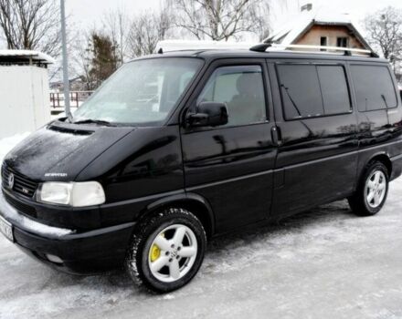 Черный Фольксваген Мультиван, объемом двигателя 2.5 л и пробегом 296 тыс. км за 2100 $, фото 1 на Automoto.ua