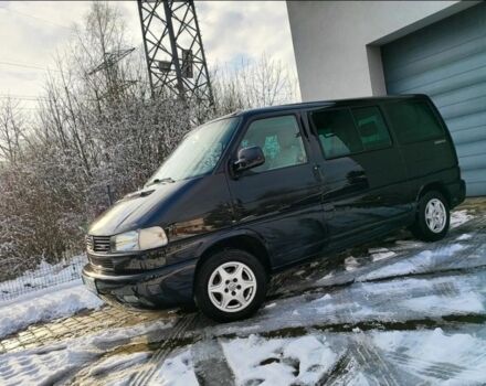 Черный Фольксваген Мультиван, объемом двигателя 2.5 л и пробегом 305 тыс. км за 3500 $, фото 1 на Automoto.ua