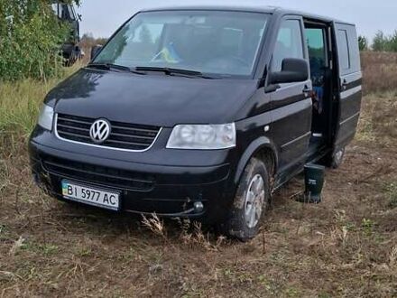 Черный Фольксваген Мультиван, объемом двигателя 2.46 л и пробегом 418 тыс. км за 13500 $, фото 1 на Automoto.ua