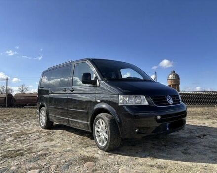 Чорний Фольксваген Мультиван, об'ємом двигуна 2.5 л та пробігом 300 тис. км за 6500 $, фото 1 на Automoto.ua