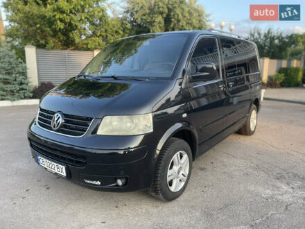 Черный Фольксваген Мультиван, объемом двигателя 2.5 л и пробегом 355 тыс. км за 9500 $, фото 1 на Automoto.ua
