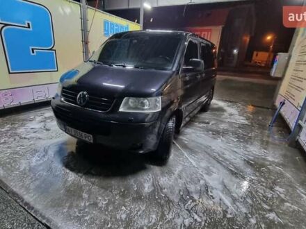 Черный Фольксваген Мультиван, объемом двигателя 2.5 л и пробегом 290 тыс. км за 13500 $, фото 1 на Automoto.ua