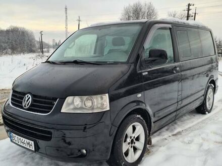 Чорний Фольксваген Мультиван, об'ємом двигуна 2.5 л та пробігом 256 тис. км за 9900 $, фото 1 на Automoto.ua