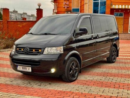Черный Фольксваген Мультиван, объемом двигателя 2.5 л и пробегом 286 тыс. км за 18500 $, фото 1 на Automoto.ua