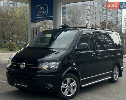 Чорний Фольксваген Мультиван, об'ємом двигуна 2 л та пробігом 311 тис. км за 21499 $, фото 1 на Automoto.ua