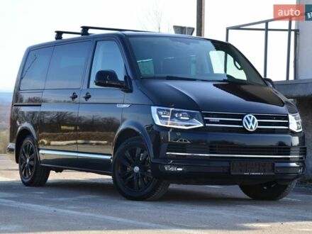 Чорний Фольксваген Мультиван, об'ємом двигуна 2 л та пробігом 216 тис. км за 41555 $, фото 1 на Automoto.ua