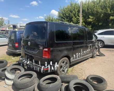 Черный Фольксваген Мультиван, объемом двигателя 2 л и пробегом 215 тыс. км за 10023 $, фото 1 на Automoto.ua