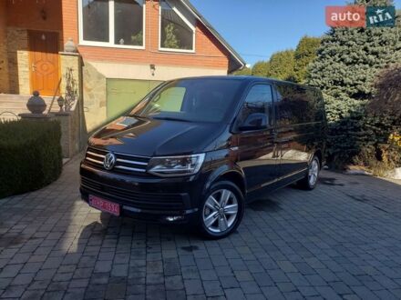 Чорний Фольксваген Мультиван, об'ємом двигуна 2 л та пробігом 255 тис. км за 34500 $, фото 1 на Automoto.ua