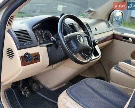 Жовтий Фольксваген Мультиван, об'ємом двигуна 2.5 л та пробігом 370 тис. км за 10999 $, фото 9 на Automoto.ua