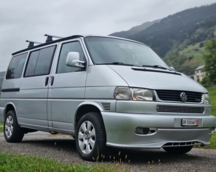 Серый Фольксваген Мультиван, объемом двигателя 2.5 л и пробегом 299 тыс. км за 11763 $, фото 1 на Automoto.ua