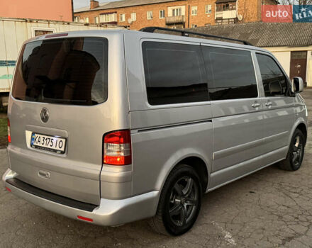 Сірий Фольксваген Мультиван, об'ємом двигуна 2.5 л та пробігом 290 тис. км за 8950 $, фото 4 на Automoto.ua